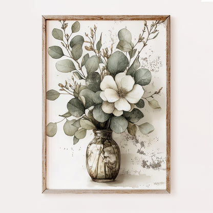 Framed artwork of a floral arrangement with a vase on a textured background