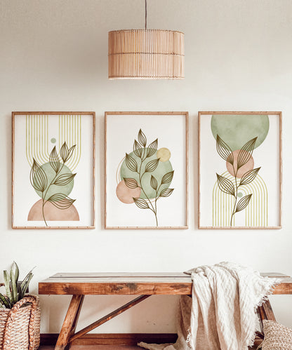 A stunning set of 3 prints illustrating circles and shapes in sage green and blush pink colours, with a golden boho style rainbow and botanical leaves incorporated into the design.
The boho style shapes are set on a white background, which bring out the vibrant colours.