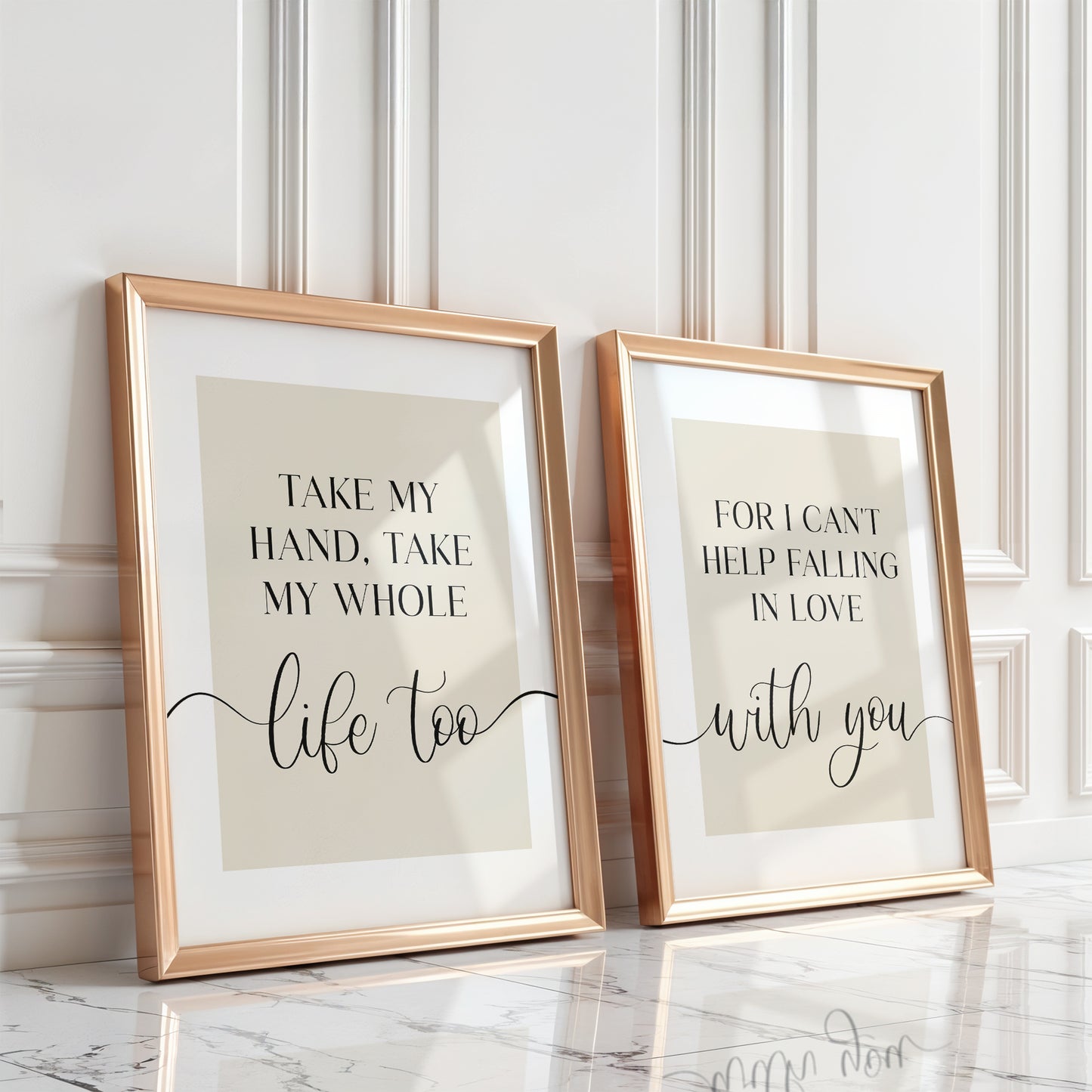 Two framed prints with romantic quote print in an elegant font set on a beige background. The quote reads 'Take my hand take my whole life too, for I can't help falling in love with you'.