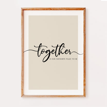 A quote print featuring the phrase 'Together is our favourite place to be', written in an elegant black font which flows from one side of the page to the other set on a beige background.